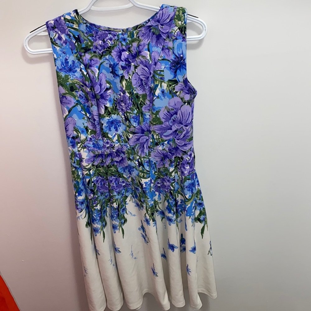 A blue purple and whole floral shirt dress